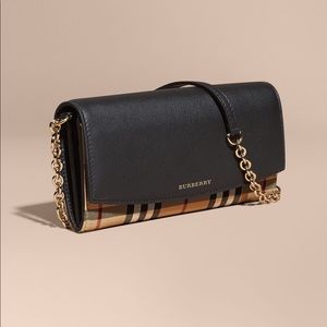 Burberry wallet on a chain.